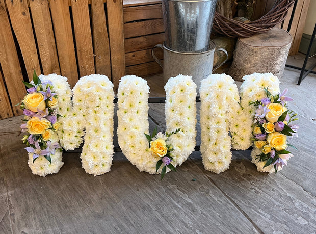 White Based Flower Letters With Colour Spray