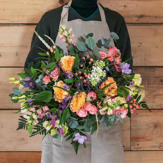 Ockeridge Bouquet is a vibrant pastel mix with bold garden roses and spray roses, as well as other seasonal flowers 