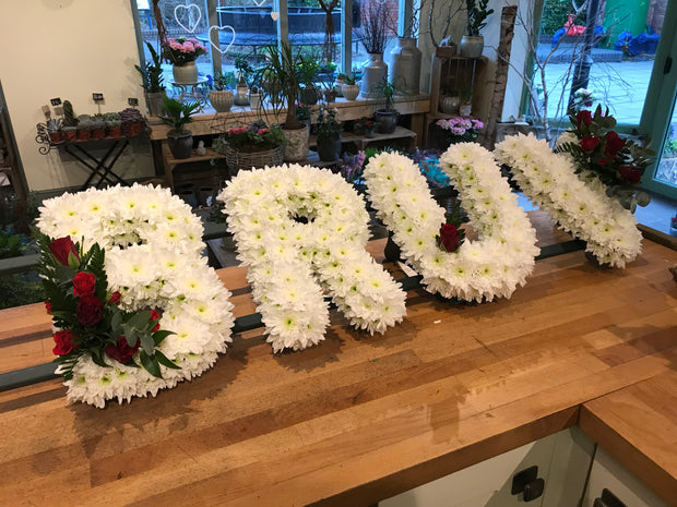 White Based Flower Letters With Colour Spray