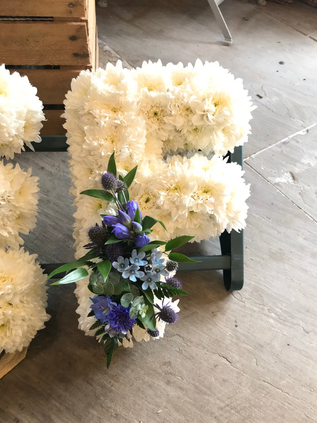 White Based Flower Letters With Colour Spray
